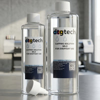 250ml & 500ml of dtgtech capping solution on a surface with a blurred office background. Value Bundle pack.