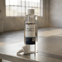 DTGtech wet cap 250ml bottle with nozzle on a workbench with light background